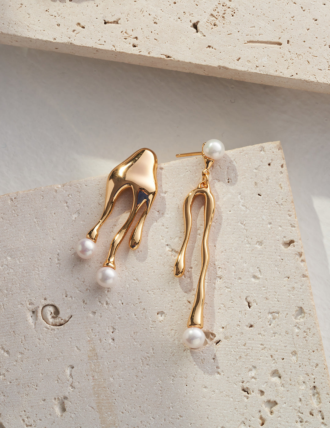 Sterling silver asymmetrical pearl earrings